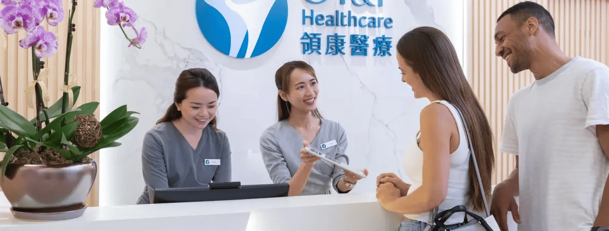 receptionists assisting a couple at OT&P